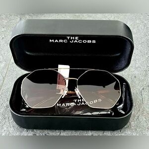 The Marc Jacobs sunglasses.